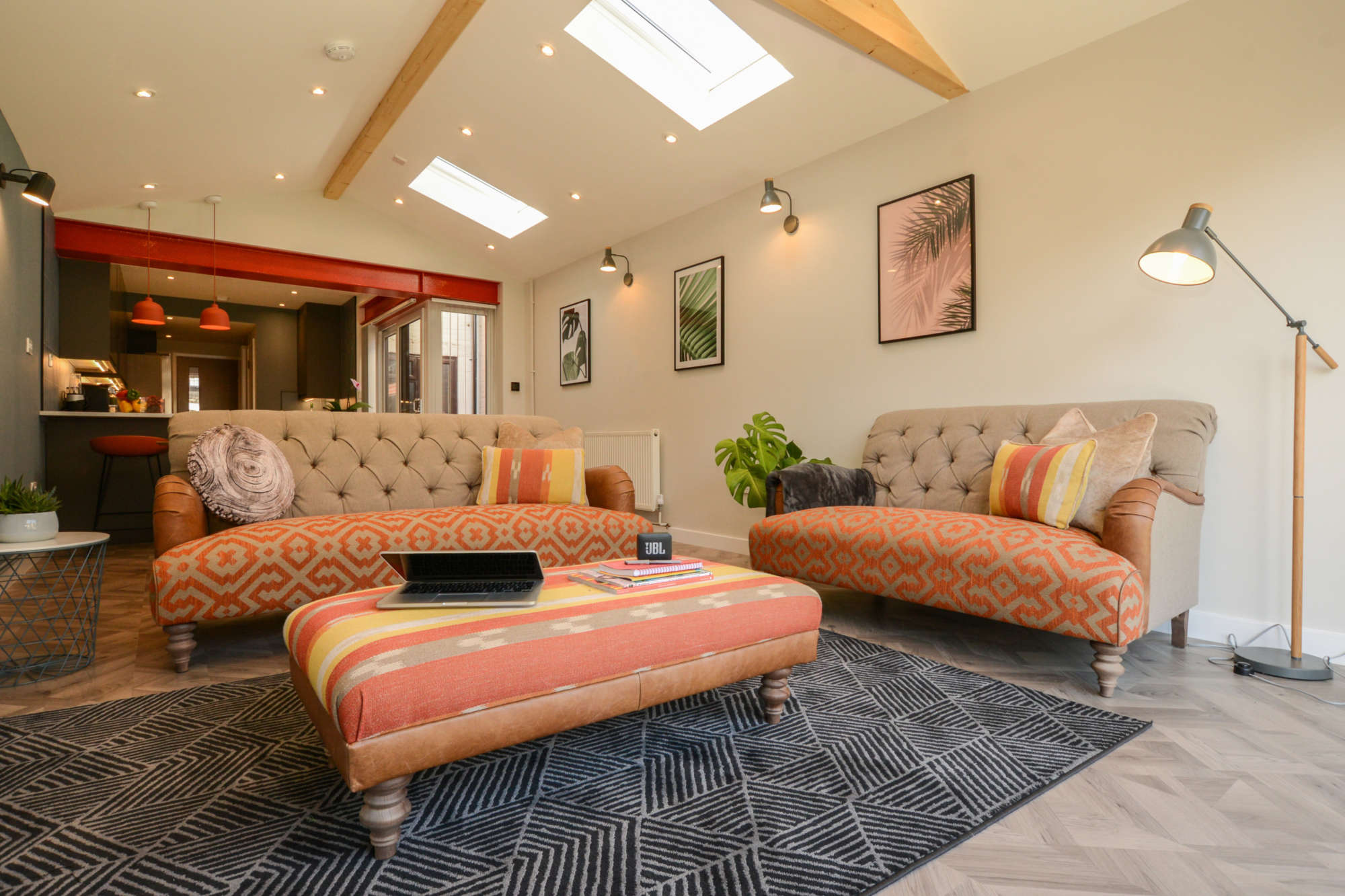 Stunning open plan living space with exposed beams